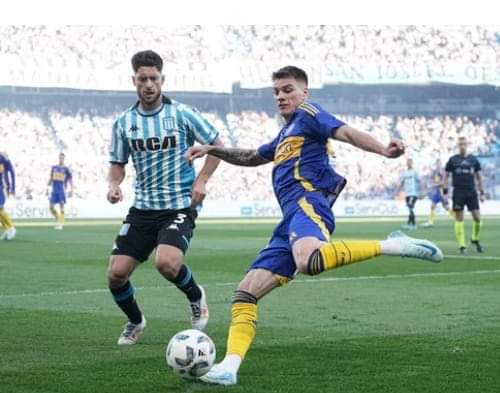 RACING LE GANÓ A BOCA Y QUEDA A SEIS DE VÉLEZ, EL LIDER DE LA LIGA PROFESIONAL.